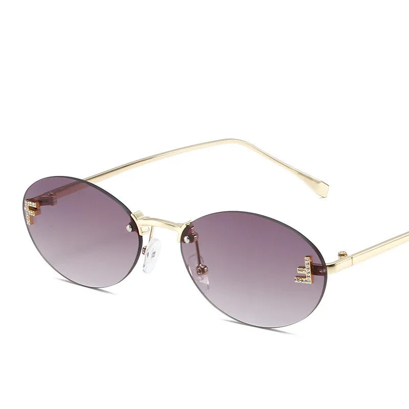Diamond "F" Rimless Oval Sunglasses – Luxury Unisex Small Frame Shades | Livia & Co