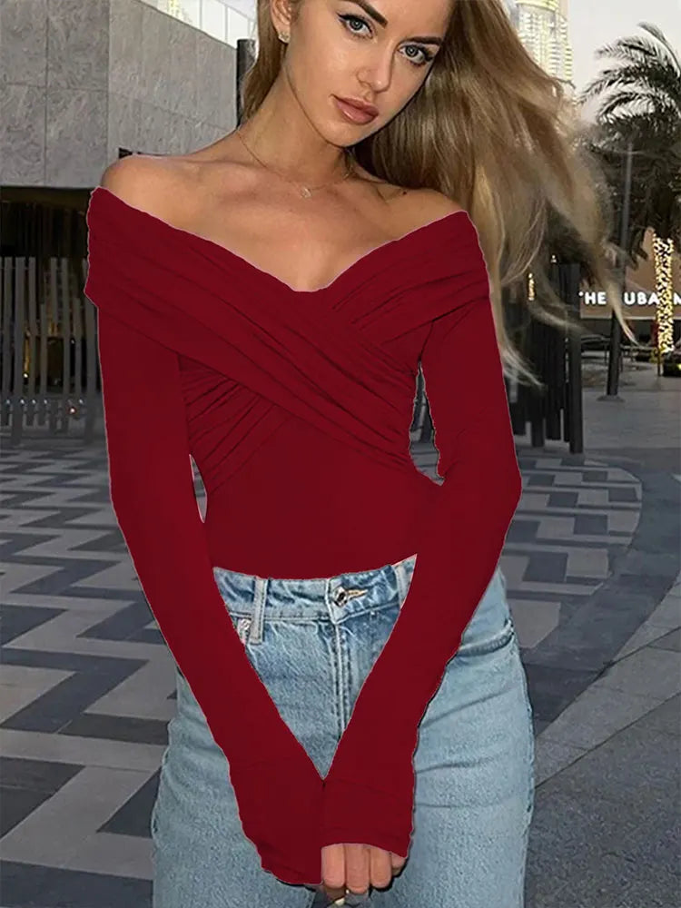 Scarlet Whispers: The Backless Symphony Bodysuit