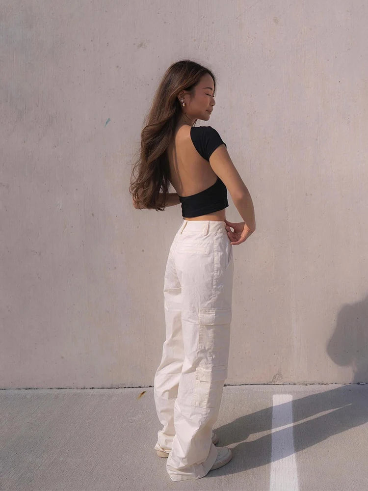 Women’s O-neck Backless T-shirt: A Symphony of Youthful Grace