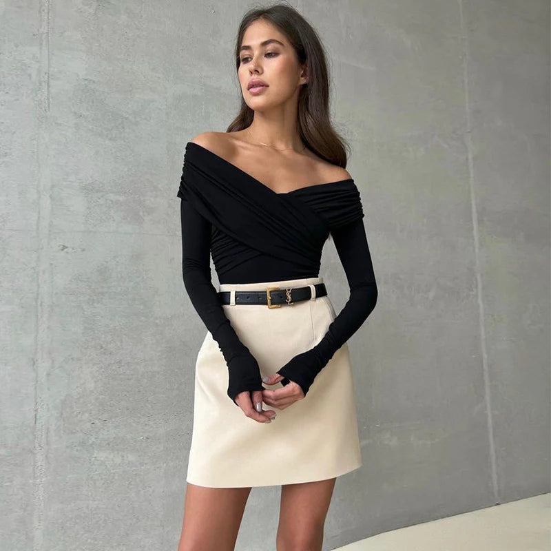 Scarlet Whispers: The Backless Symphony Bodysuit