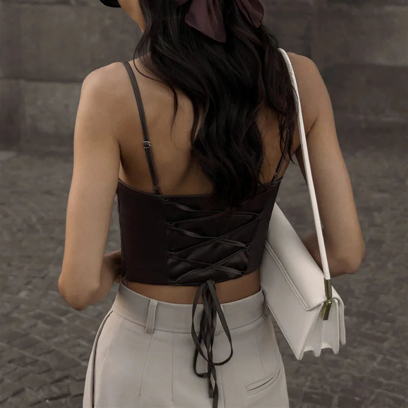 Whispers of Elegance: The Lace-Up Backless Spaghetti Strap Tank Top