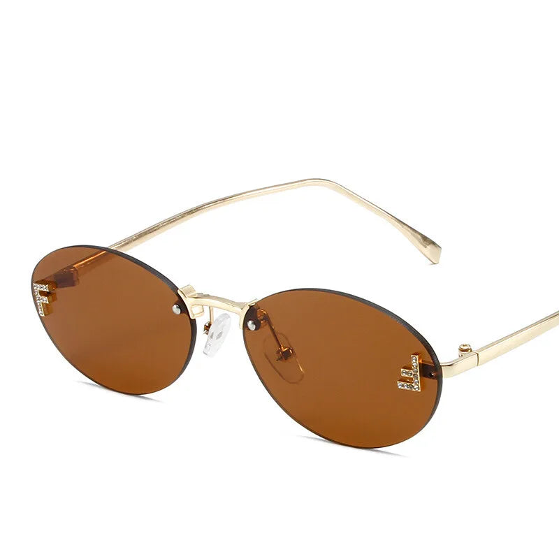 Diamond "F" Rimless Oval Sunglasses – Luxury Unisex Small Frame Shades | Livia & Co